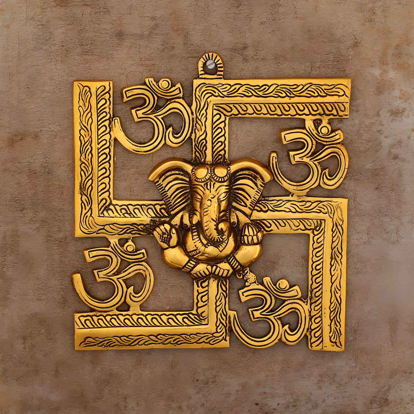 Lord Ganesha on Om Swastik Metal Golden Wall Hanging